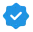 青いチェックマークのバッジの画像